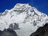 Gokyo 3 5 Gyachung Kang Close Up From Near Gokyo Gyachung Kang (7952m) shines bright white in the late morning sun from the terminal moraine of the Nguzumpa Glacier from beyond Gokyo.